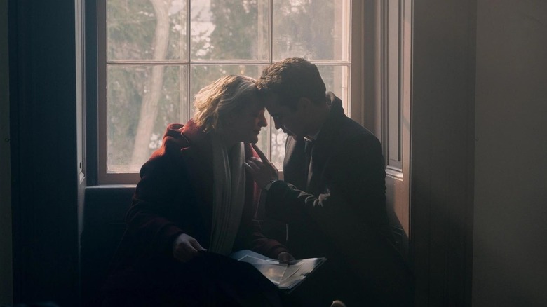 Elisabeth Moss and Max Minghella as June and Nick in The Handmaid's Tale