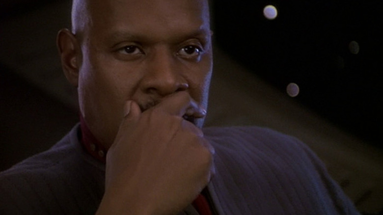 Sisko looking concerned in Star Trek: Deep Space Nine