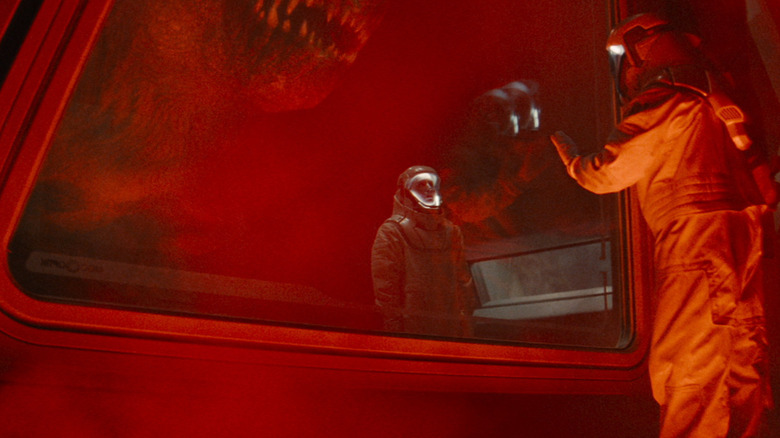 The D-rex getting ready to eat the scientist in the opening scene of Jurassic World Rebirth