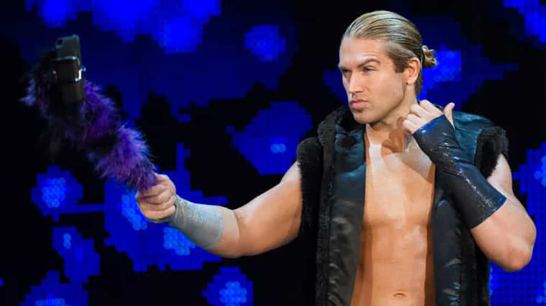 Tyler Breeze posing for the selfie stick in WWE