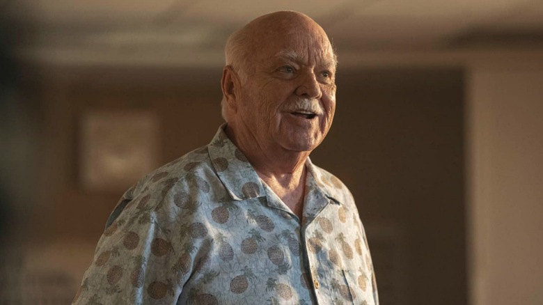 Brian Doyle-Murray smiling as Bob Kruger in Lodge 49