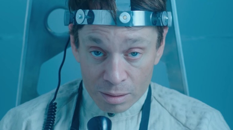 Chris Kattan as Subject 3 staring into the camera while restrained in The Soviet Sleep Experiment