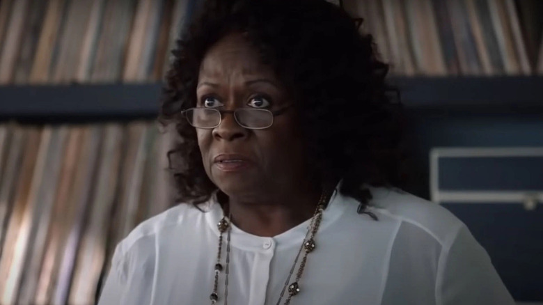 Aloma Wright as Gretchen, looking concerned on Suits