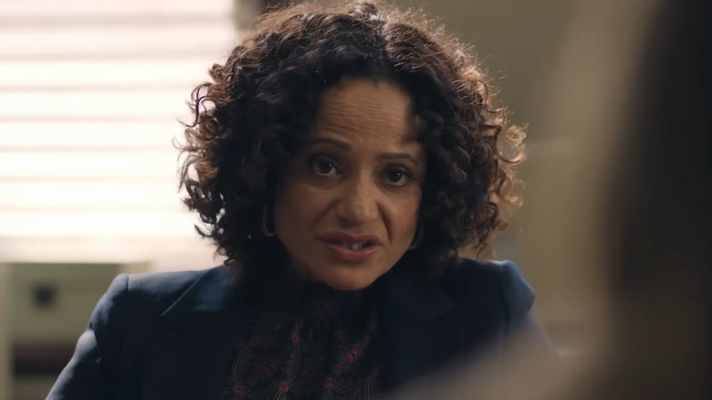 Judy Reyes as Selena Soto, interrogating someone in High Potential