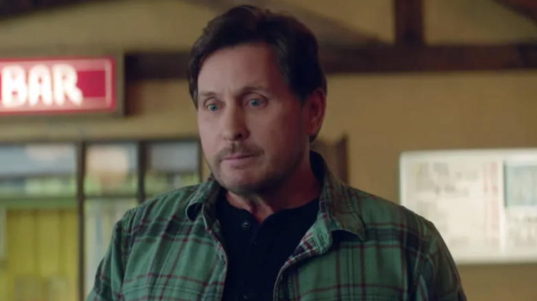 Emilio Estevez as Gordon Bombay standing outside in The Mighty Ducks: Game Changers