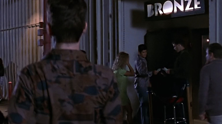 The exterior of The Bronze is seen with customers outside in Buffy the Vampire Slayer