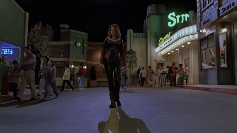 Alyson Hannigan's Willow walks down Sunnydale's main street in Buffy the Vampire Slayer