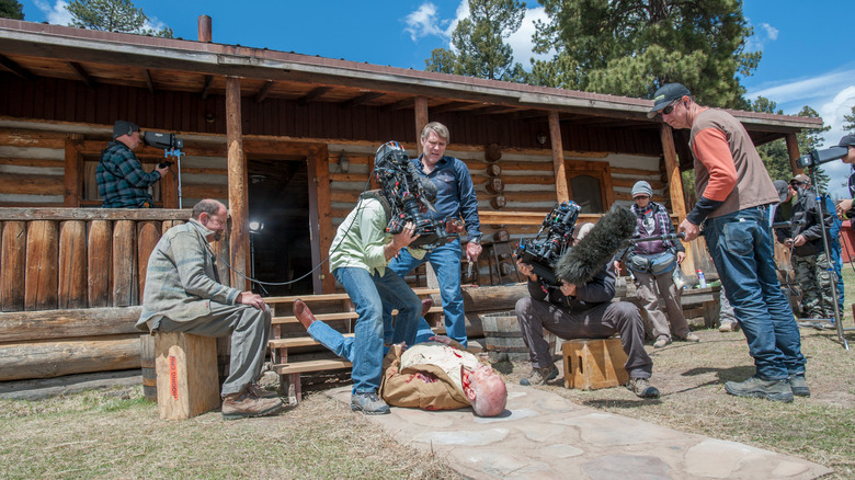 Behind-the-scenes photo of filming at Walt Longmire's (Robert Taylor) cabin in Longmire