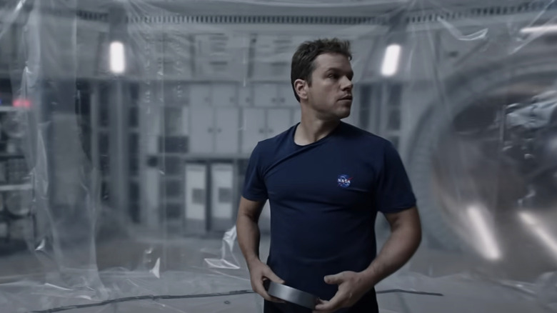 Damon died, Dr. Mark Watti, standing in his surface home on Mars in Mars