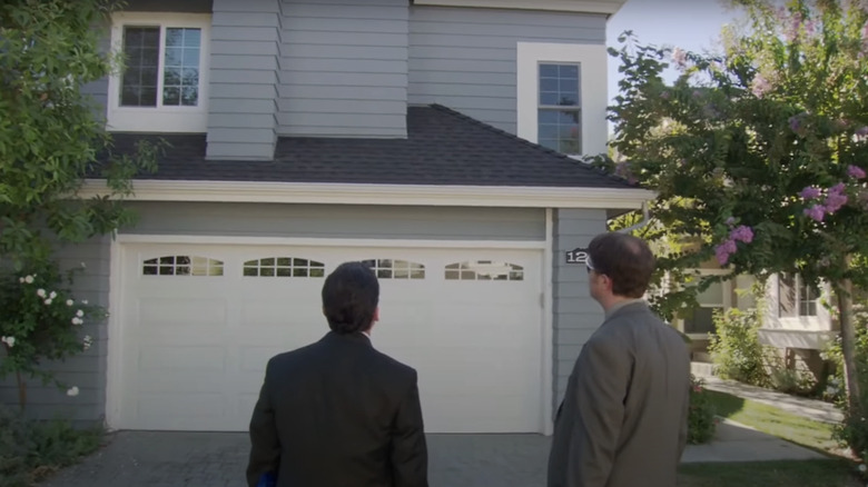 Steve Carrell's Michael Scott and Rainn Wilson's Dwight Schrute stand outside of Michael's condo in The Office