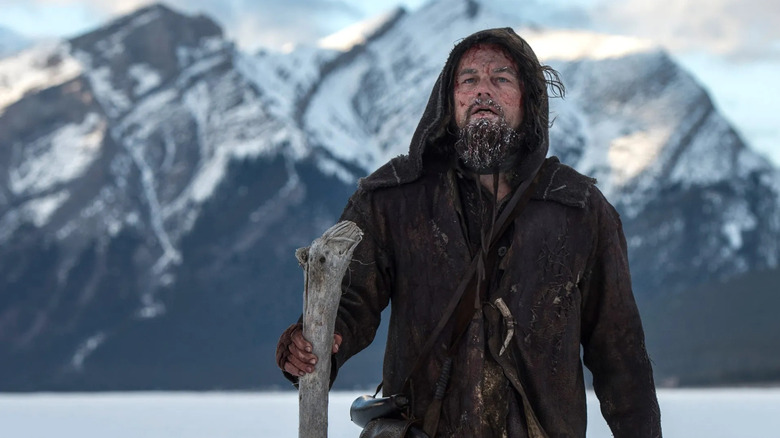 Hugh Glass lost in the snow, a bloodied face in The Revenant.