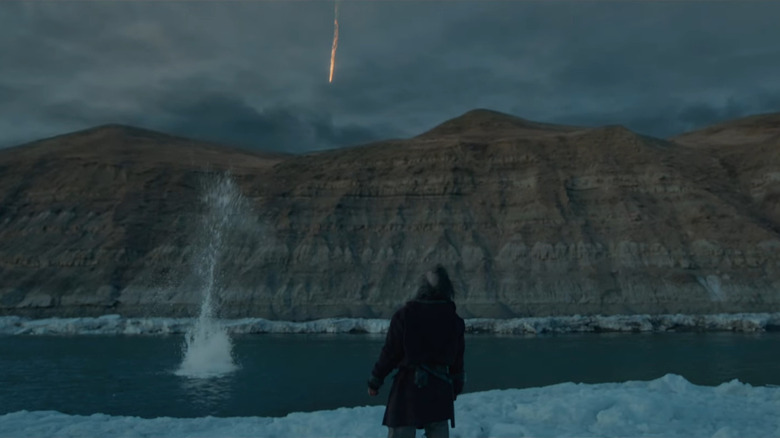 A shadowy figure by a creek in The Revenant.