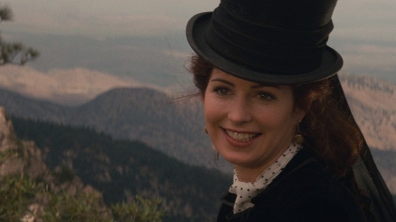 Dana Delany as Josephine smiling in Tombstone