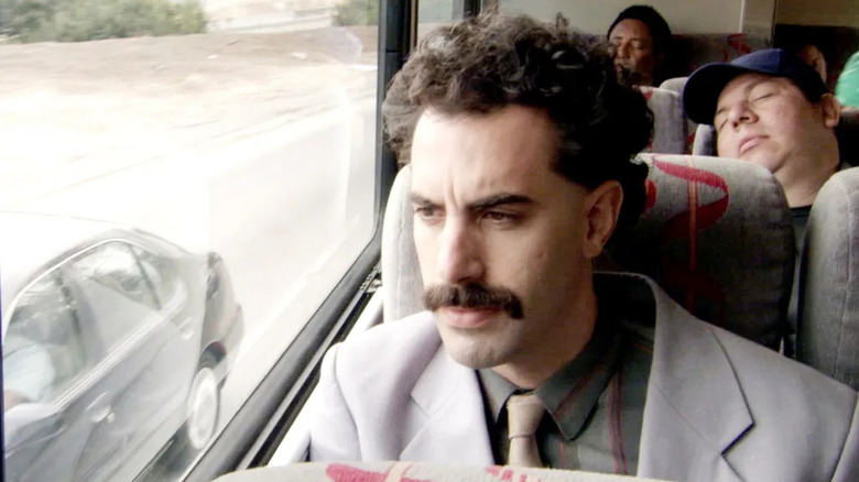 Borat on a bus in Borat