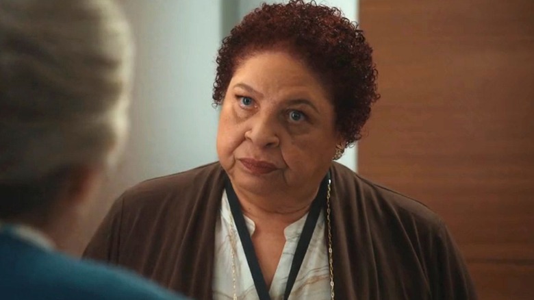 Patricia Belcher as Mrs. B scowling at Matlock on Matlock