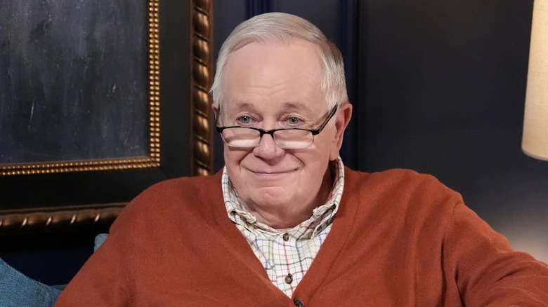 Sam Anderson as Edwin smiling with glasses on on Matlock