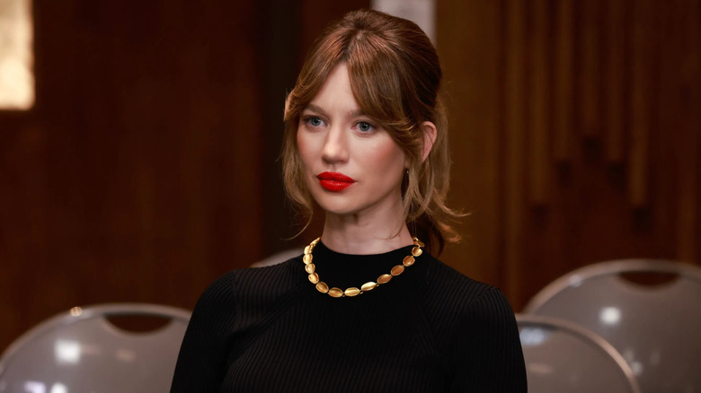 Yael Grobglas as Shae sitting in a courtroom on Matlock