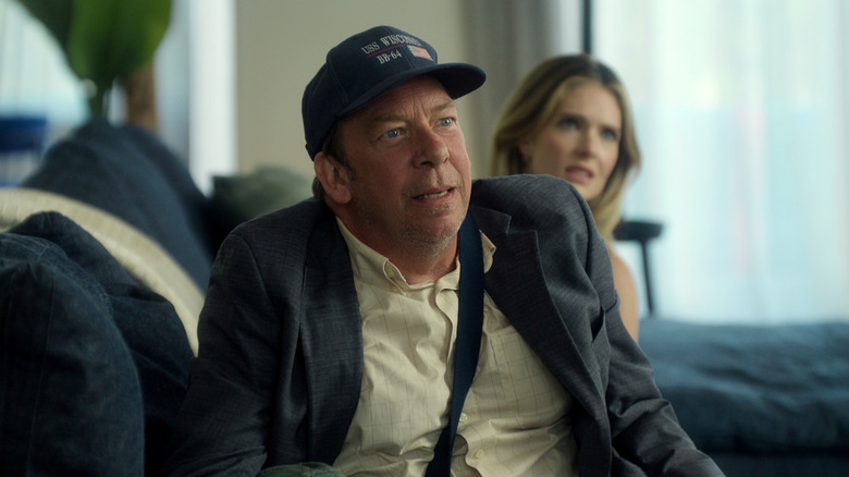 Bill Camp as Bruce Dewitt, sitting on a couch on Sirens