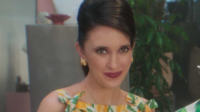 Erin Neufer as Lisa, smirking on Sirens