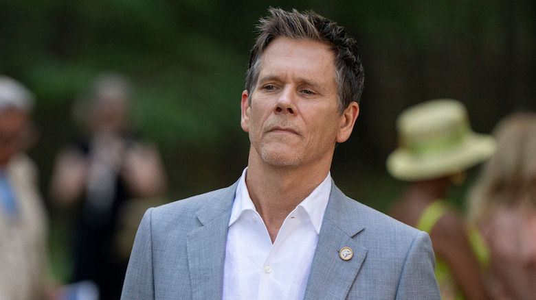 Kevin Bacon as Peter Kell, looking skeptical on Sirens