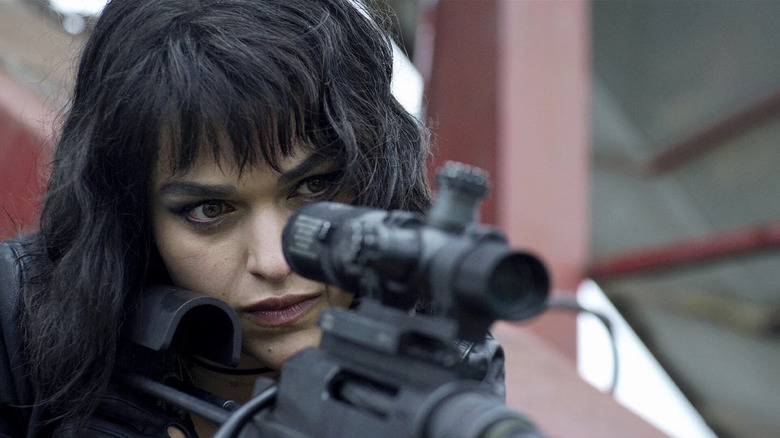 Eve Harlow takes aim with a high-powered rifle as Ellen in The Night Agent