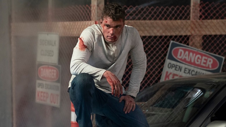 Gabriel Basso is bruised and bloodied as Peter Sutherland in The Night Agent