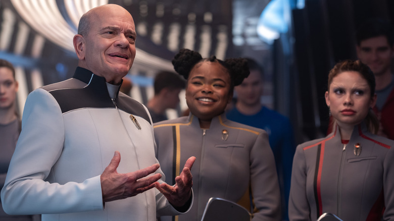 Robert Picardo as The Doctor, Kerrice Brooks as Sam, and Bella Shepard as Genesis in season 1 , episode 1 of Star Trek: Starfleet Academ