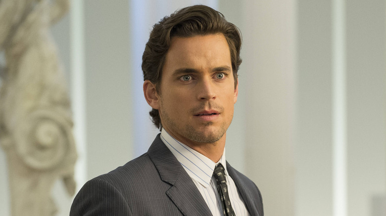 Neal Caffrey in a suit looking surprised in White Collar