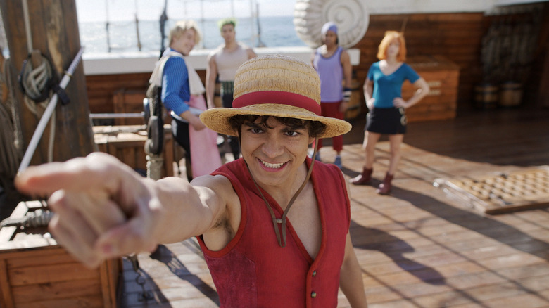 Luffy pointing the way to signal the Straw Hats' next destination in One Piece