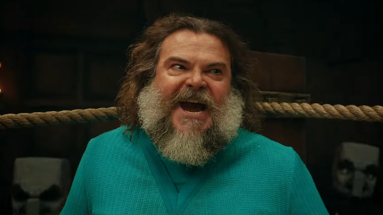 Steve in a wrestling ring, yelling something in A Minecraft Movie