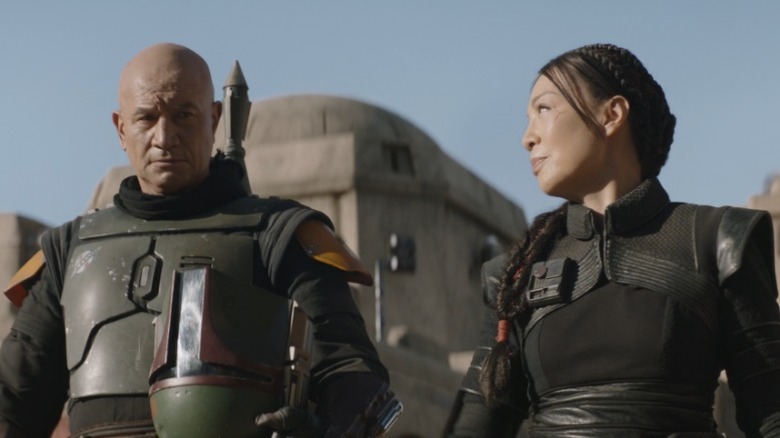 Boba Fett and Fennec Shand talk strategy in Mos Espa