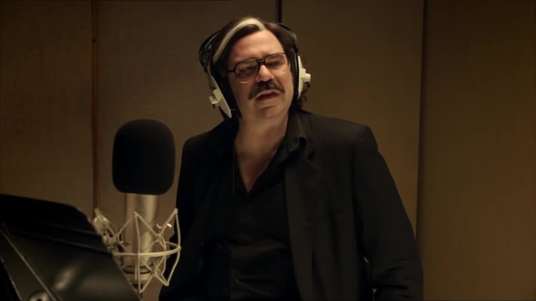 Matt Berry as Steven Toast in a recording booth in Toast of London
