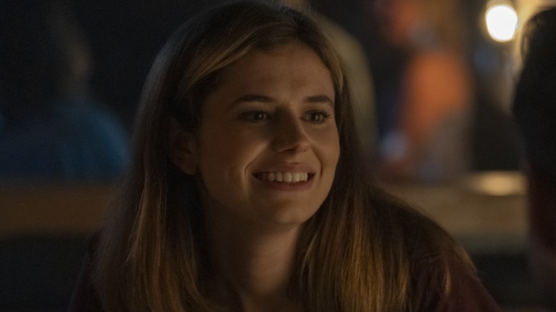 Alison Oliver as Lizzie smiling in Task Episode 3