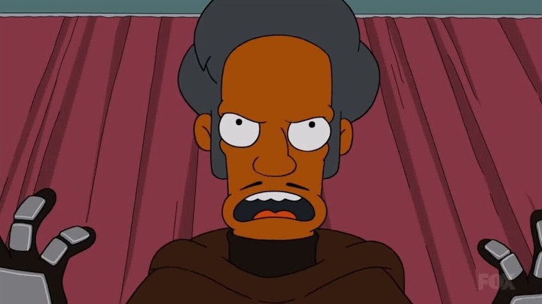 Apu raising his hands as he vows to get vengeance on the town of Springfield in The Simpsons