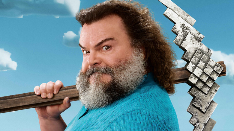 Character poster for The Minecraft Movie featuring Jack Black as Steve, holding a pickaxe