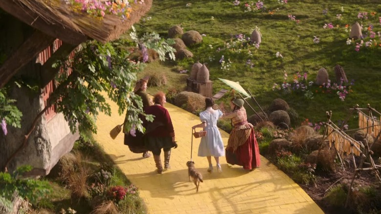 Bethany Weaver as Dorothy skipping down the Yellow Brick Road in Wicked: For Good