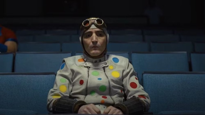 David Dastmalchian's Polka-Dot Man sitting and looking awkward in The Suicide Squad