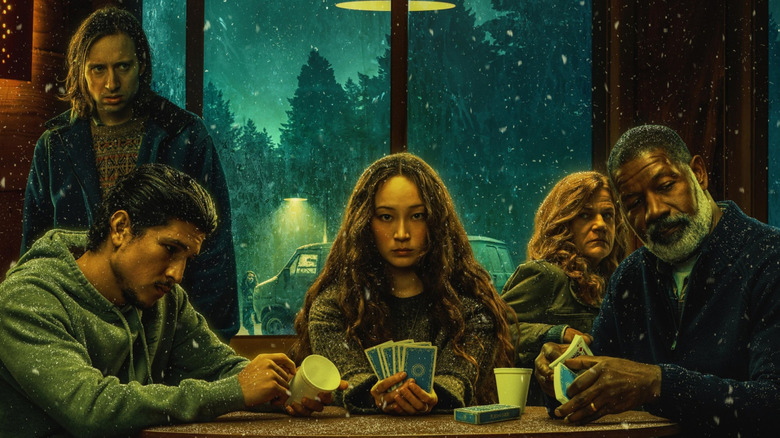Danny Ramirez as Ash, Havana Rose Liu as Darby, David Rysdahl as Lars, Dale Dickey as Sandi, and Dennis Haysbert as Ed gathered around a card table in No Exit
