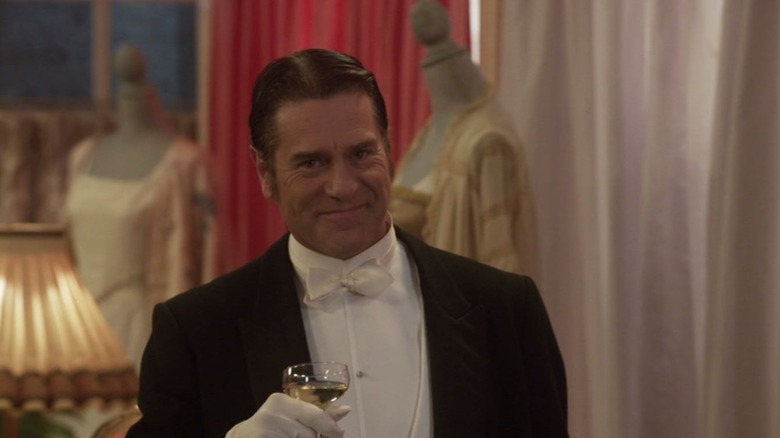 David Keeley wearing a tuxedo and holding a drink as one of his characters on Murdoch Mysteries