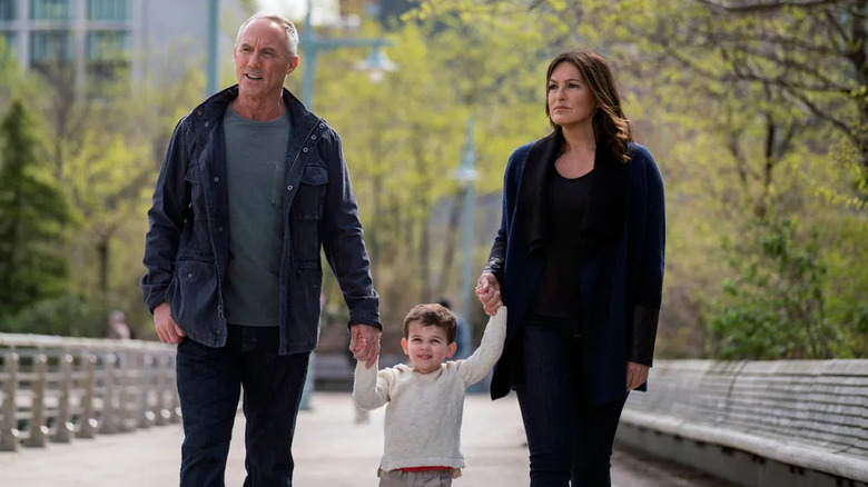 Tucker and Benson holding hands with Noah on Law & Order: Special Victims Unit