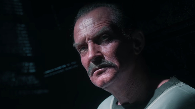 A close up of Ulrich Thomsen as Sinestro in jail in Lanterns Season 1