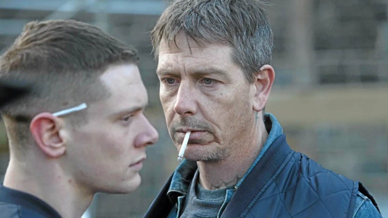 Jack O'Connell and Ben Mendelsohn as a smoking father and son in Starred Up