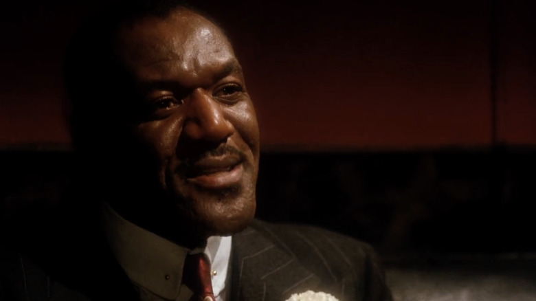 Delroy Lindo looks elegant like the West-Indian Archie in Malcolm X
