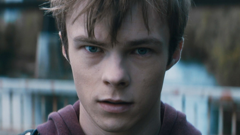 Nicholas Hamilton's Nate is seen in closeup in Brave the Dark