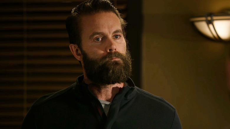 Garret Dillahunt's Francis Wolcott is seen in closeup in Deadwood