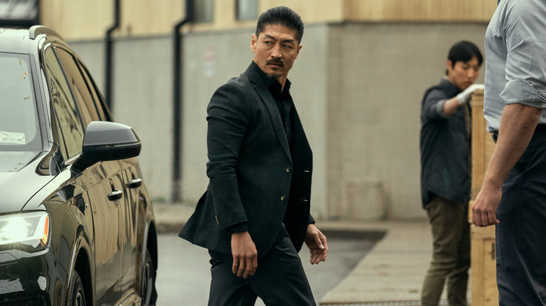 Brian Tee's Xavier Quinn wearing black on Reacher