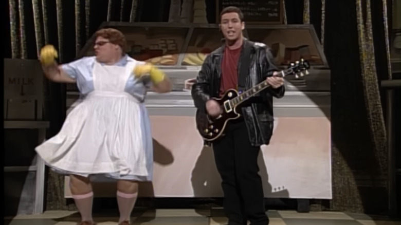 Adam Sandler plays the guitar next to Chris Farley as the Lunch Lady on "Saturday Night Live"