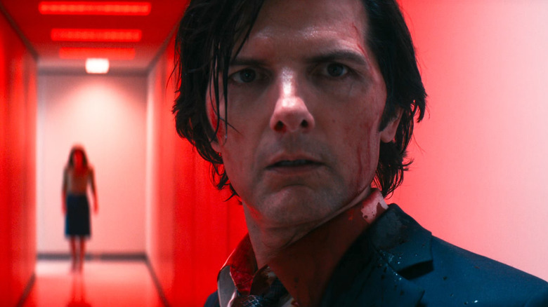 Mark S. standing bloodied in a hallway in Severance