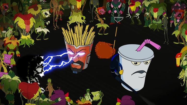 Frylock, Master Shake, and Meatwad do battle with a throng of nasty-looking creatures in Aqua Teen Hunger Force
