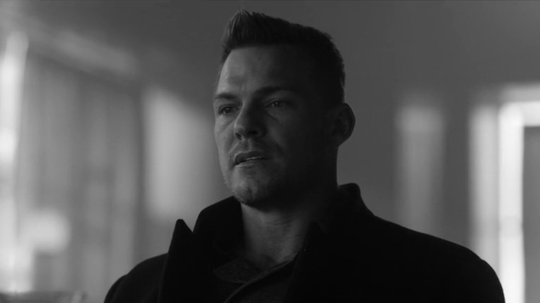 Alan RItchson as Hank Hall is seen in black and white in the afterlife in Titans